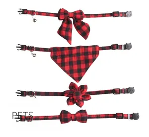 Detail showing four red buffalo plaid cat collars with bowties and bandanas