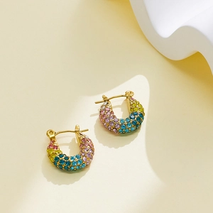 Detail of 18k gold plated huggie earrings with colorful pave rainbow crystals