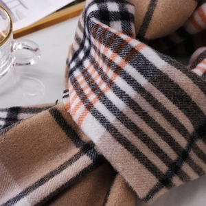 Australian wool plaid scarf in khaki and orange featuring classic checkered patterns