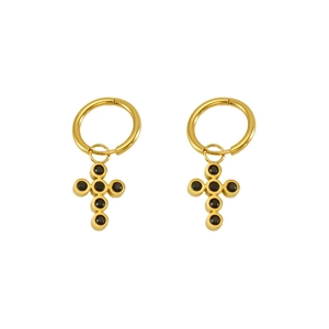 Close-up of golden hoop earrings featuring black zircon stones in a cross pendant