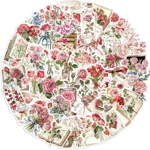 Macro view of floral aesthetic stickers with vintage roses and botanical elements