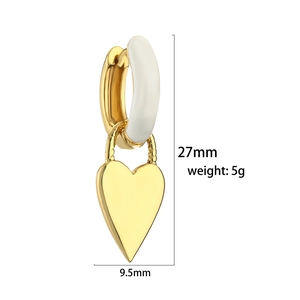 Detailed view of heart hoop earrings with dimensions 27mm height and white enamel inlay