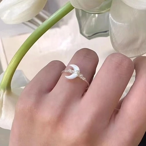 Elegant woven silver moon ring with mother-of-pearl finish and clear beads for women