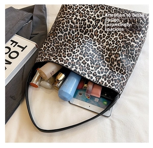 Spacious leopard print tote bag interior showing large capacity for daily essentials
