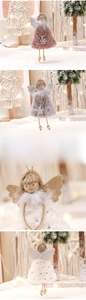 Detailed view of handmade plush Christmas angels with faux fur and snowflake sequins