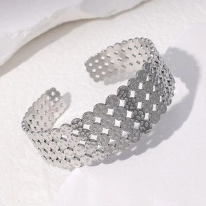 Minimalist silver open cuff bracelet in stainless steel with hollow geometric design