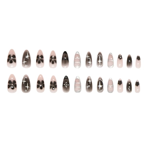 Star pattern almond press-on nails with 3D pearls and black gradient design