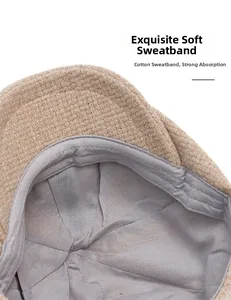 Detail of soft cotton sweatband inside the beige newsboy cap for better comfort