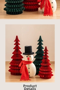 Close-up of honeycomb paper Christmas trees and snowmen for festive holiday scene decor