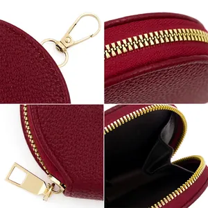 Litchi pattern round zipper coin purse with gold hardware hook and black lining