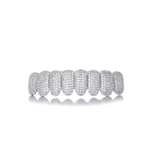 Macro detail of silver hip hop grillz featuring iced-out white zircon pave settings