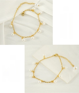 Detail of 18K gold stainless steel anklet with white pearls and lobster clasp