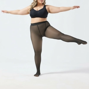 Detail of high-waist elastic waistband on sheer black plus-size thermal leggings