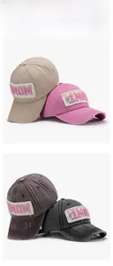 Detailed view of washed vintage baseball caps with frayed MOM letter embroidery patches