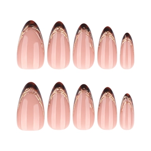 Brown tortoiseshell almond press-on nails with golden wavy lines and nude base