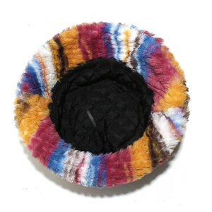 Detail view of colorful faux fur bucket hat with warm quilted lining and adjustable cord
