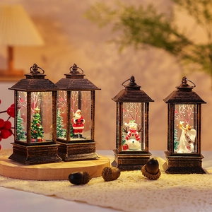 Vintage Christmas LED lanterns with Santa and snowman scenes on a cozy wooden tray
