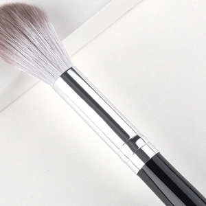 Tapered highlight brush with soft gradient bristles and sleek black polished handle