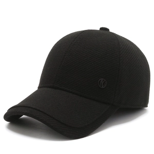Mid-aged men's winter wool baseball cap in black with textured fabric and a side emblem