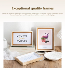 Detail of white and wood grain PS resin picture frames with 45-degree mitered corners