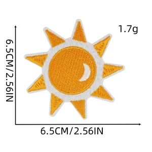 Detail of embroidered sun patch showing 6.5cm dimensions and yellow-orange needlework texture