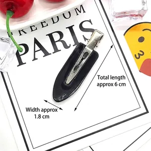 Detail view of 6cm black alloy duckbill hair clip for DIY crafts and accessories