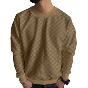 Men's khaki crewneck sweater with heavy jacquard waffle texture and long sleeves