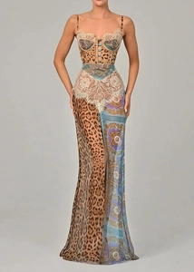 Detail of leopard print maxi dress with lace stitching and corset bustier structure