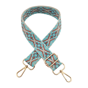 Detail of blue and brown geometric jacquard strap with gold metal lobster clasps