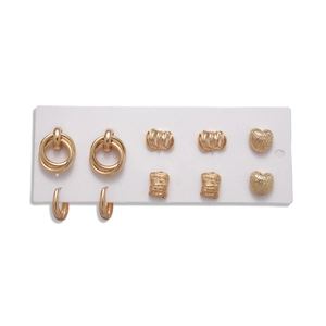 Set of 5 pairs of geometric gold earrings including hoops and textured heart studs