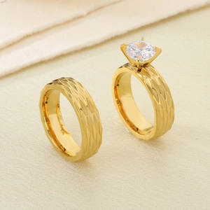 Detail view of 18K gold plated ring set with 6mm zircon and rhombus texture details