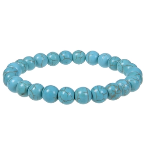 Detail of blue turquoise beaded bracelet showing natural brown vein patterns and texture