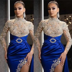 Royal blue evening dress with lace embroidery, high collar, and thigh-high side slit