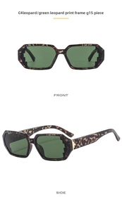 Detail view of irregular tortoiseshell frame sunglasses with dark green G15 lenses