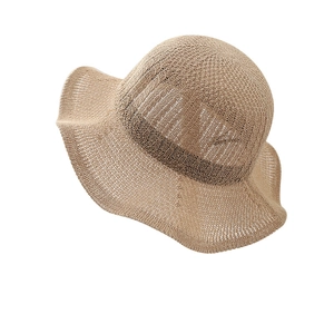 Women's hollow knit sun hat in light khaki with wide wavy brim for summer beach sun protection