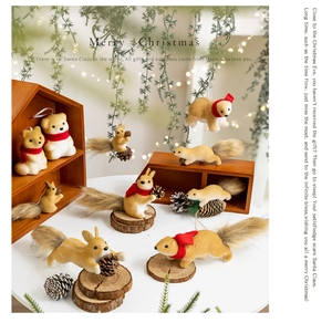 Close-up of artificial Christmas squirrels and bears with pine cones on festive wooden stand