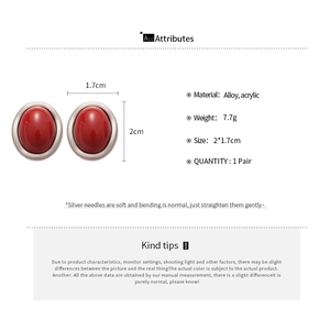 Detailed view of red acrylic oval stud earrings with silver needle and size specifications