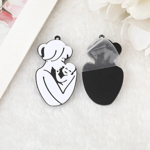Detail of Mother's Day acrylic pendant showing mother and baby silhouette and protective film