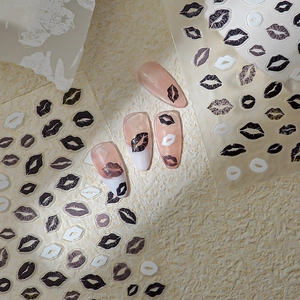 Lipstick kiss nail art stickers in black, white and bronze for sexy Valentine manicures