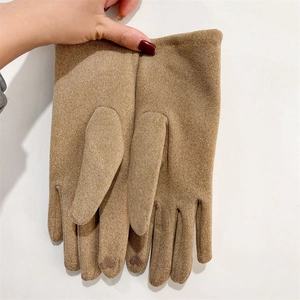 Detail of camel winter glove showing the heart-shaped touchscreen fingertip on the index finger