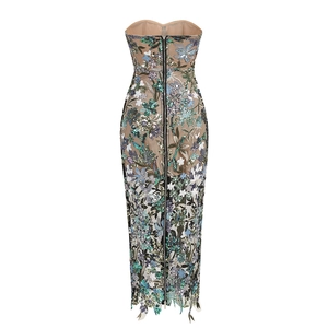 Close-up of intricate floral embroidery and shimmering sequins on a mesh evening gown
