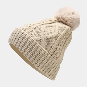 Beige cable knit beanie with faux fur pom pom for women's winter warmth and style
