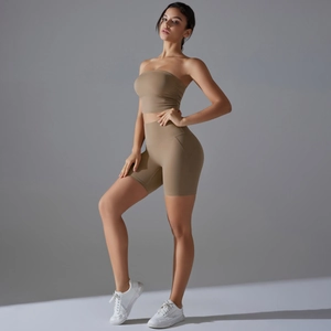 Detailed view of camel sports set with bandeau top and high waist compression shorts
