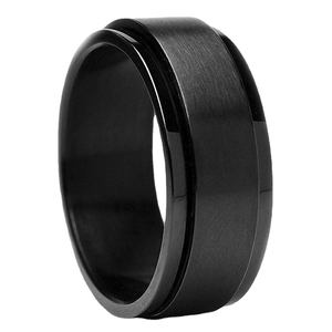 Minimalist black stainless steel spinner ring with brushed texture and polished edges
