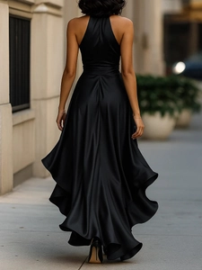 Rear view of an elegant black satin halter backless maxi dress with ruffled fishtail hem