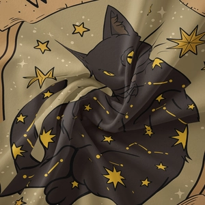 Close-up of bohemian black cat tapestry showing woven texture with stars and constellations