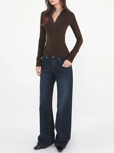 Slim fit dark brown zip-up sweater paired with stylish wide-leg denim jeans for women