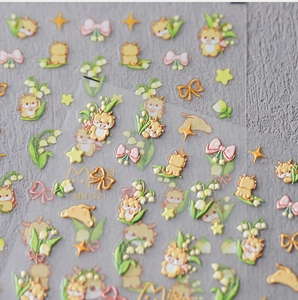 Macro detail of 3D embossed nail stickers featuring zodiac dragon and floral motifs