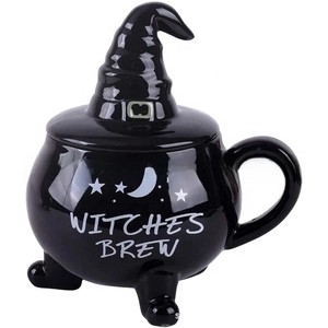 Detail view of the Witches Brew black ceramic cauldron mug with matching hat-shaped lid