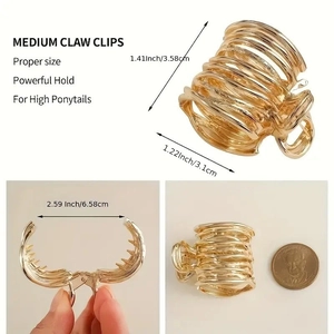 Detailed size and dimension overview of a golden metal claw clip for ponytails